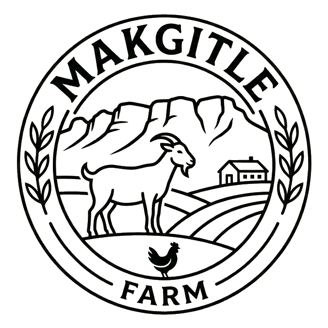Makgitle Farm circular crest with goat, mountain and farmhouse motif